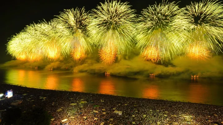 Rio de Janeiro New Year Fireworks Crowds enjoy the Rio de Janeiro New Year fireworks on Copacabana Beach